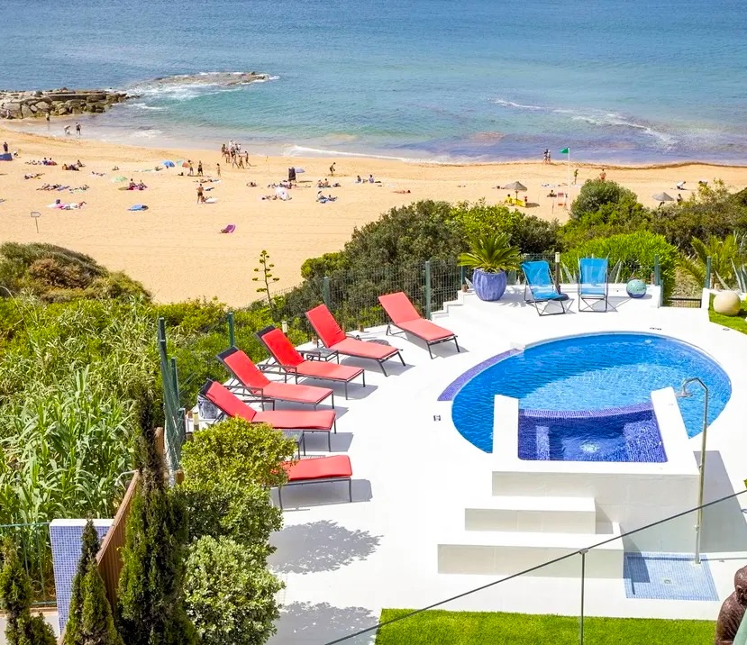 Luxury beach house rental Albufeira Portugal — private pool Atlantic coast