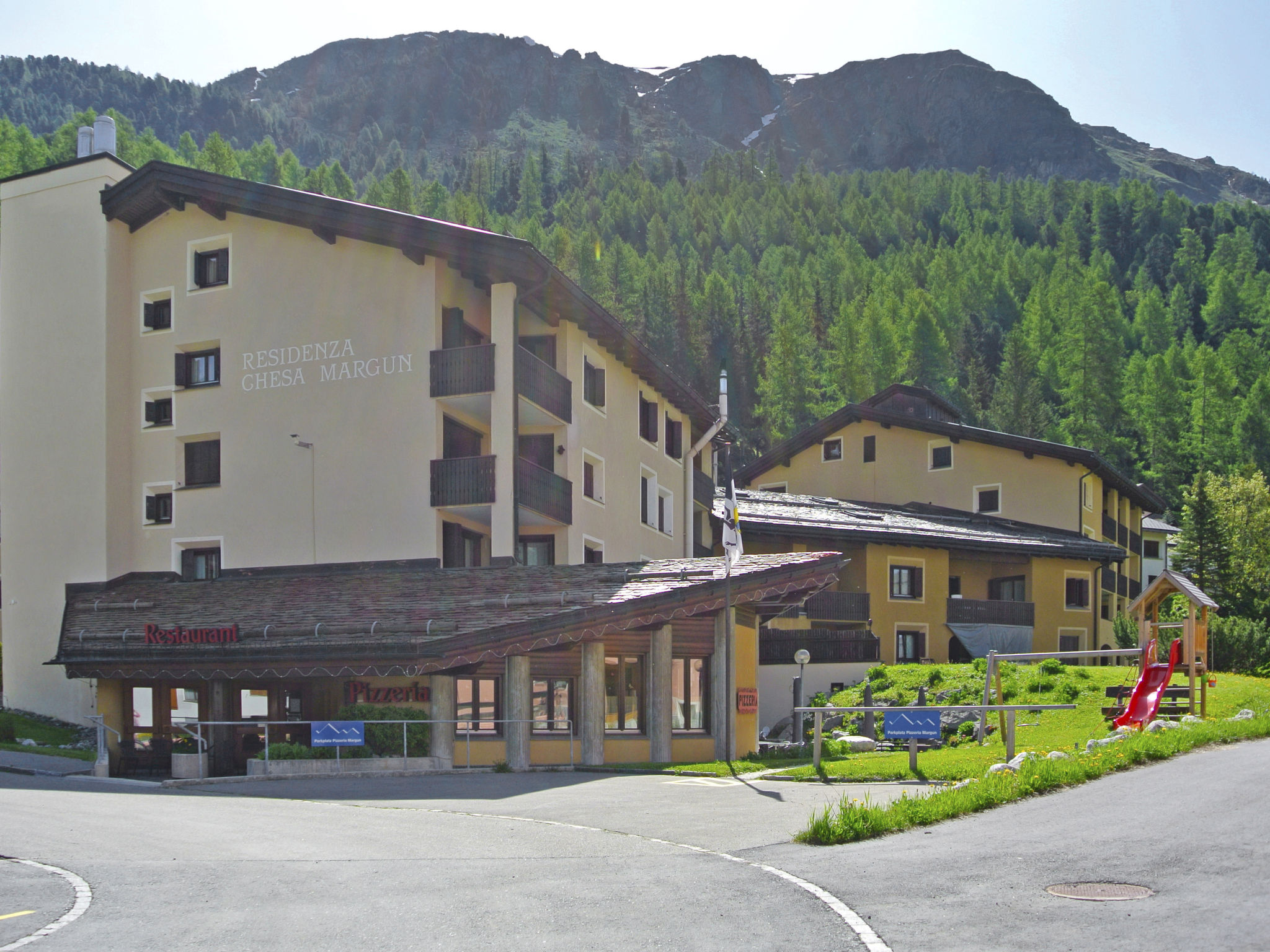 Chalet Marguns Silvaplana: Elegant 2-Bedroom Alpine Apartment Near Corvatsch Ski Slopes in Swiss Engadin Valley
