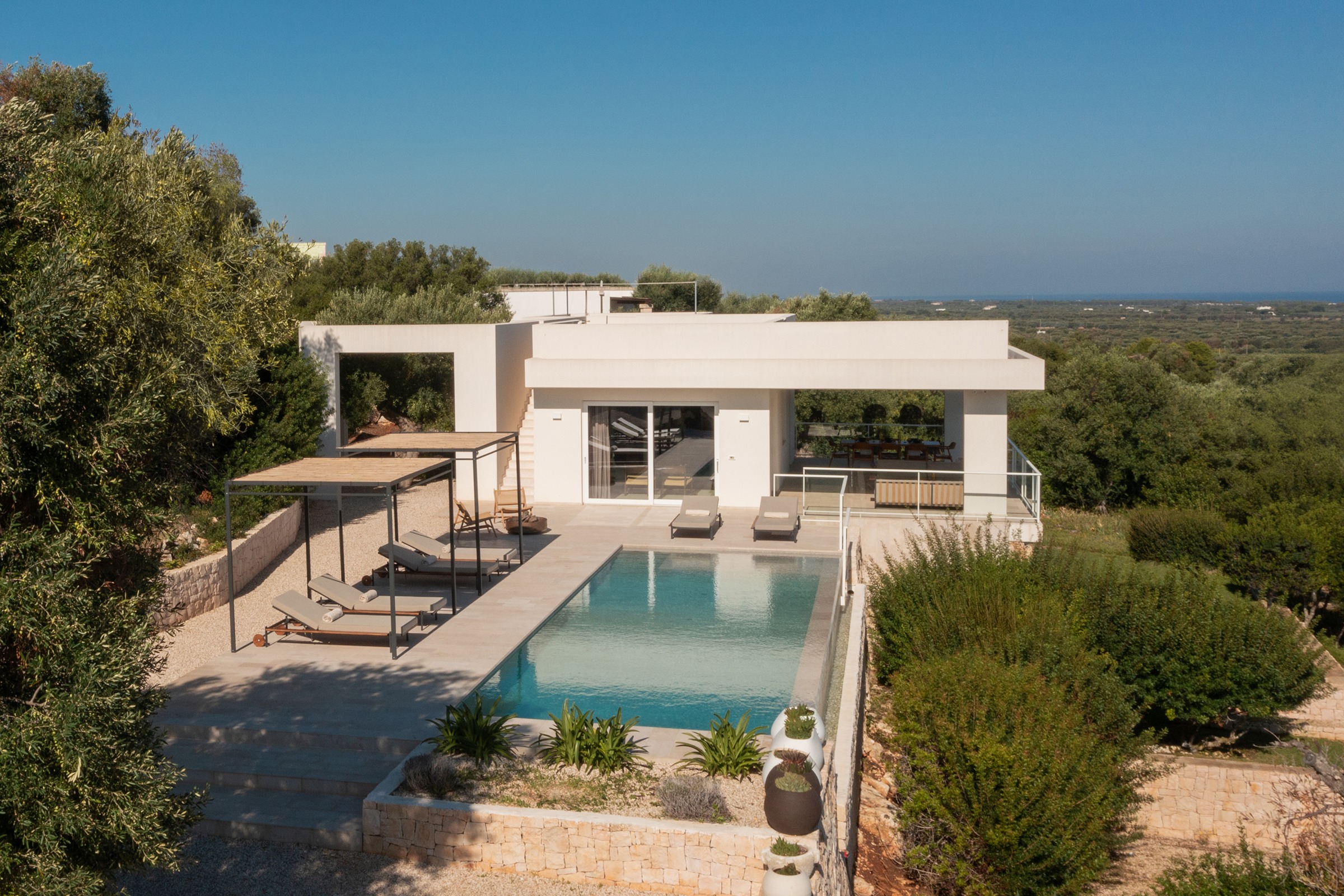 Trullo Lenticchia Ostuni Ostuni: Luxurious 3-Bedroom Apartment with Infinity Pool and Sea Views, Ostuni