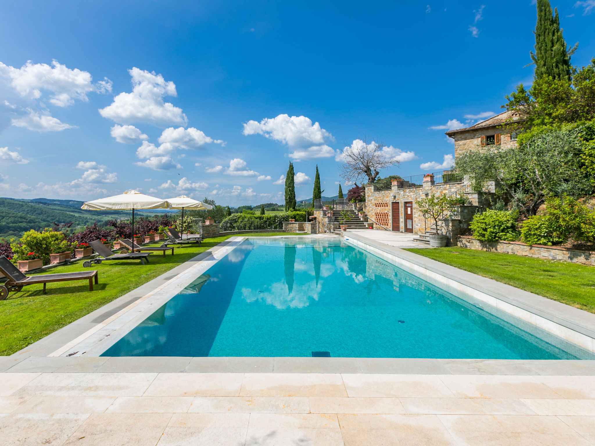 Villa Savignola Chianti: Elegant Two-Bedroom Stone Farmhouse with Shared Pool in Historic Tuscan Vineyard Estate