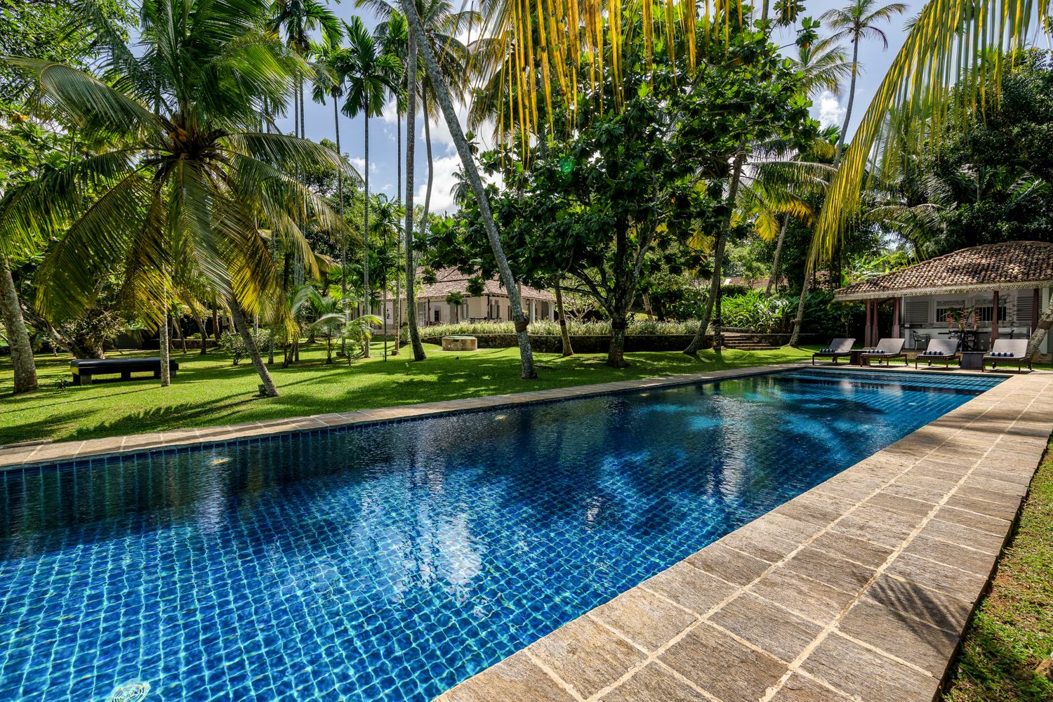 Villa Ravana Galle Sri Lanka

Wait, let me reconsider the location and local language (Sinhala).

Villa Sanda Unawatuna Sri Lanka: 4-Bedroom Beachfront Villa with Rice Field Views in Southern